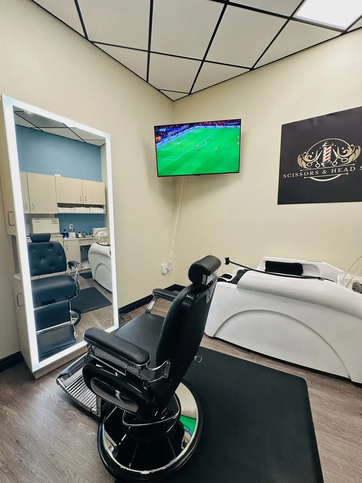 Salon interior with styling stations and mirrors
